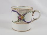 an image of a coffee cup with a floral design on it