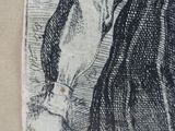 an old drawing of a man holding a cat in his hand