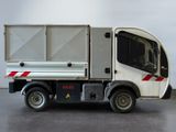 a white truck with a red stripe on the side of it