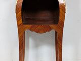 an image of a small wooden table with a marble top