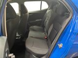 a blue car with black seats and a black seat belt