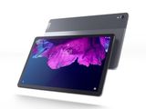 une tablette posée sur une surface blanche