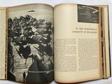 an open book with a black and white photo of a group of soldiers
