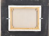 an image of a picture frame with a picture hanging on it