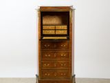 a tall wooden cabinet with drawers and a wicker basket on top of it
