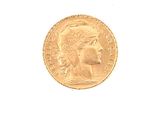 an image of a gold coin with a woman ' s head on it