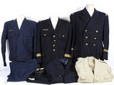 three men ' s military uniforms are displayed on a white surface