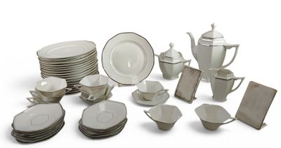 many different types of dishes and cups on this table