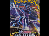 a close up of a bag of pokemon cards on a black background