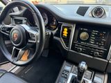 the interior of a car with a steering wheel and dashboard controls