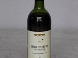 a bottle of wine that is sitting on a table