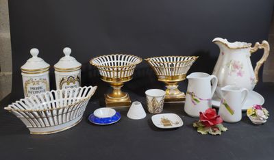 many different types of vases and bowls on the table