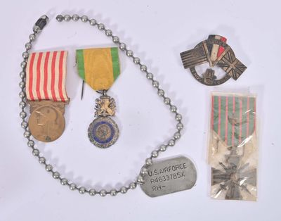 a lot of military items that are laying out on the table