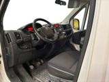 the interior of a white van with a steering wheel and dashboard