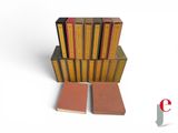 several books stacked on top of each other on a white surface