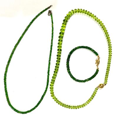 green beaded necklace and bracelet set on a white background