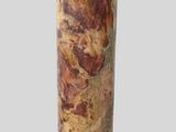 a marble column with a clock on top of it