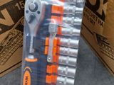 a package of tools in a box on the floor