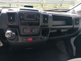 a dashboard of a truck with a steering control panel