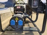 an image of a generator on a stand in a garage