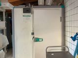 an image of a kitchen with a sink and a refrigerator