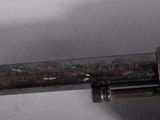 a close up of a metal pipe with a wrenet