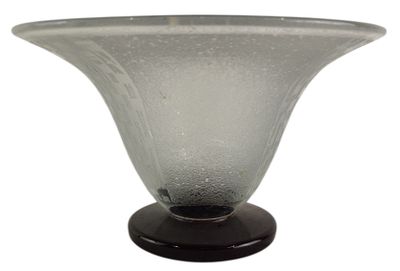a glass vase with a black base on a white background