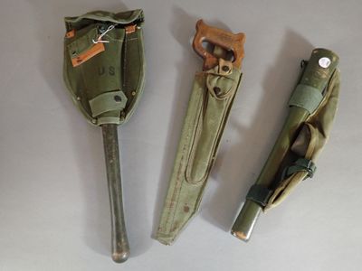 three different types of military items are displayed on a white surface