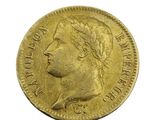 a close up of a gold coin on a white background