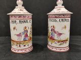 pair of antique french hand painted porcelain canisters with figurines