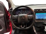 the interior of a car with a steering wheel and dash panel