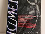 a close up of a book on a table with a white background