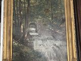 a picture of a painting on a shelf in a room