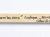 a wooden stick with a drawing of a plane on it