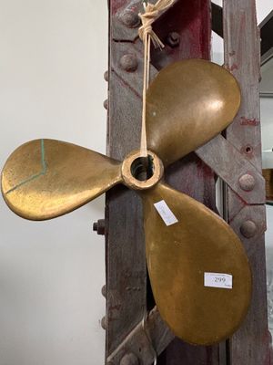 a propeller that is attached to the side of a building