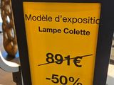 a sign that says modele d ' exposition lampe collectle
