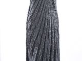 a black and white photo of a dress on a mannequin mannequin