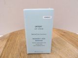 an image of a box of cream on a wooden table