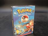 a box of pokemon trading cards sitting on a table