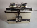 an old camera that is sitting on a table