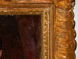 portrait of a woman in a yellow dress in a gold frame