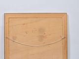 two pieces of wood that are on a white surface