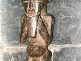 a statue of a man with a hat on it ' s head