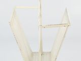 an image of a white metal chair on a white background