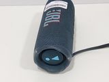an image of a bluetoothed speaker on a white surface