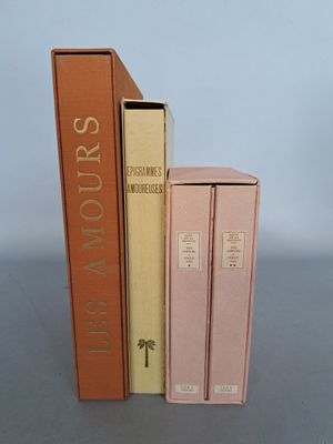 two books that are sitting next to each other on a table