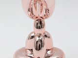 an image of a rose gold heart shaped candle holder