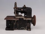 an old sewing machine that is sitting on a table