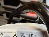 a close up of a machine with a sticker on it