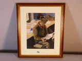 tableau représentant un homme assis sur un banc en train de lire un livre